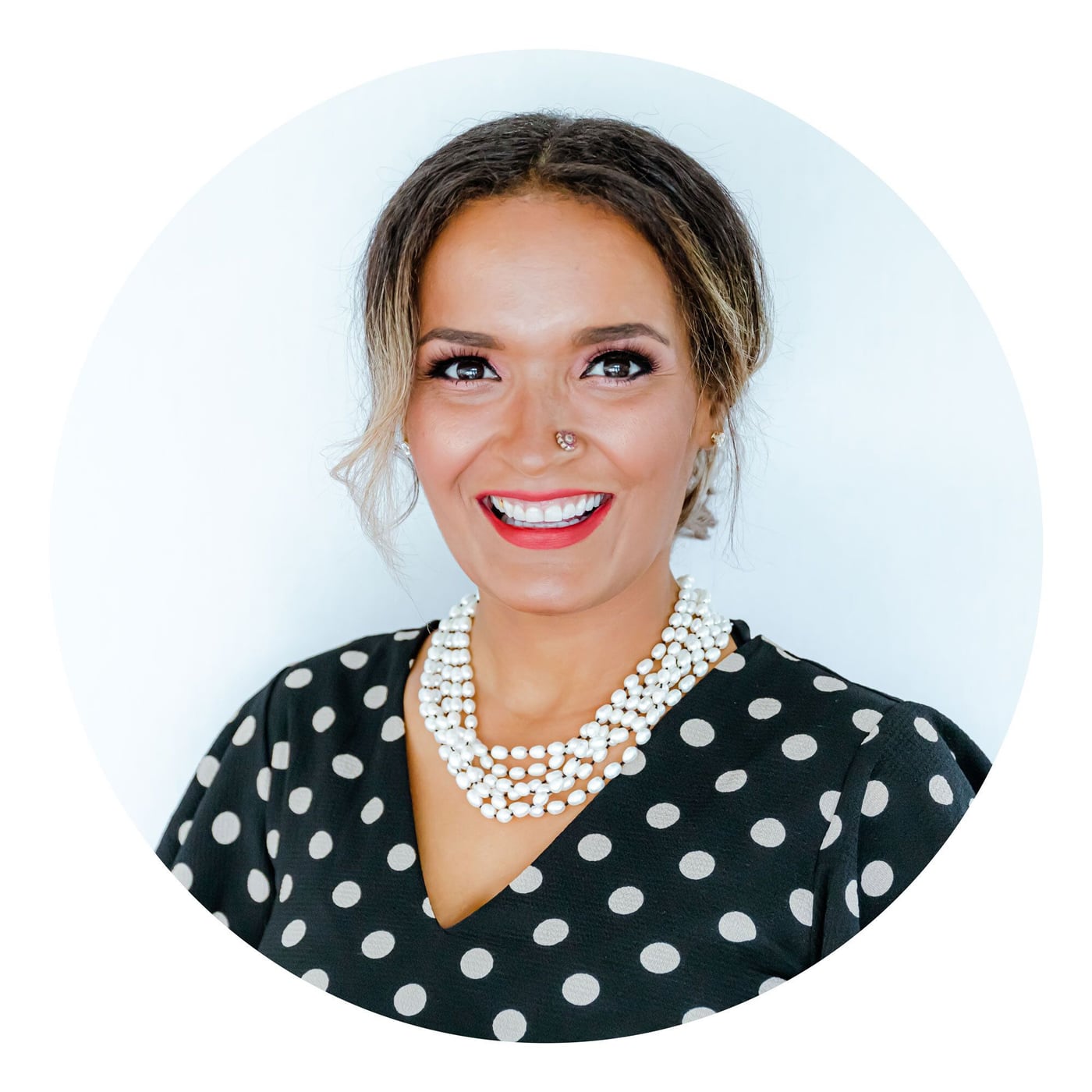 Denisse, owner and lead photographer of Ocala Event Photography and Lotus Eyes Photography